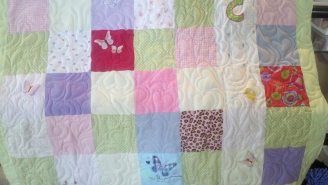 memory quilt from onesies, patchwork style